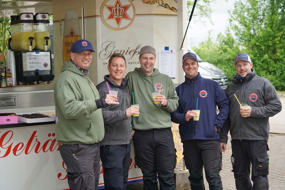 Teilnehmer an einem Slush Stand
